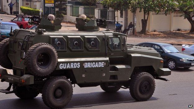 Nigeria troops patrol the city of Abuja, Nigeria, Saturday, Feb. 7, 2015