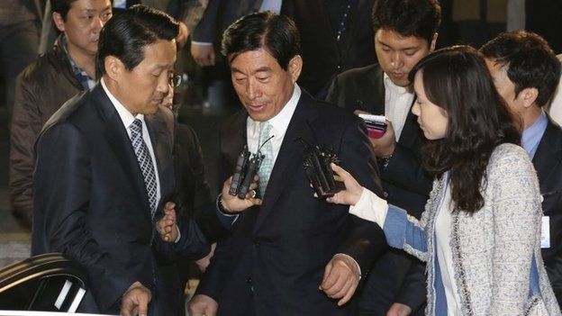 File photo: former National Intelligence Service director Won Sei-hoon, centre, leaves the Supreme Prosecutors' Office in Seoul, South Korea, 30 April 2013