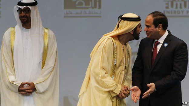 President Abdel Fattah al-Sisi speaks to Dubai's ruler, Sheikh Mohammad bin Rashed al-Maktoum at the opening of the World Future Energy Summit in Dubai