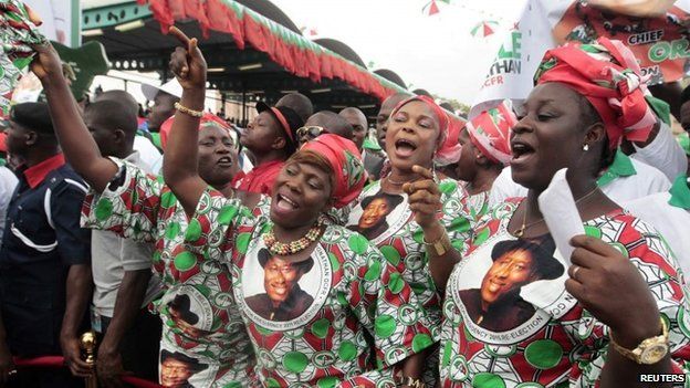 Supporters of Nigeria's President Goodluck Jonathan react during his declaration to seek a second term in the February 2015 presidential election, in Abuja in this 11 November 2014 photo