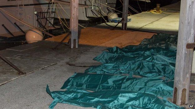 The bodies of migrants who died of hypothermia after being rescued off the Italian coast, 9 February 2015
