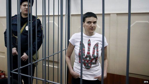 Ukrainian pilot Nadiya Savchenko stands in a cage in a court room in Moscow, Russia - 10 February 2015