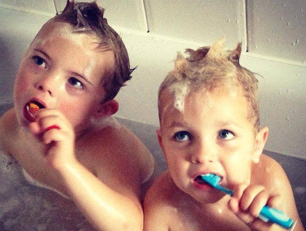 Seb and his brother in the bath