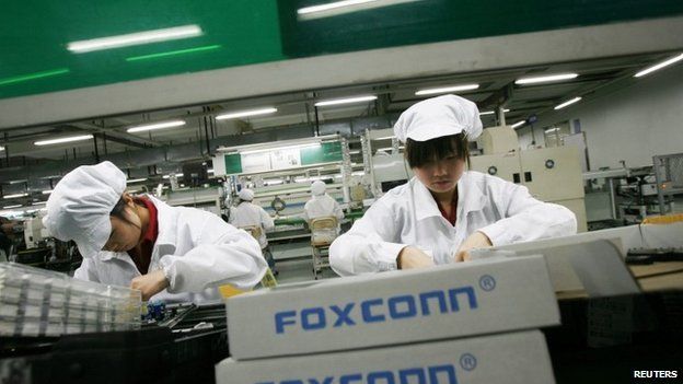 Employees into a Foxconn factory