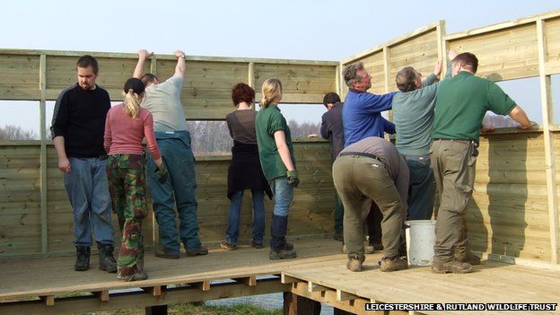 Volunteers build a bird hide at Rutland Water