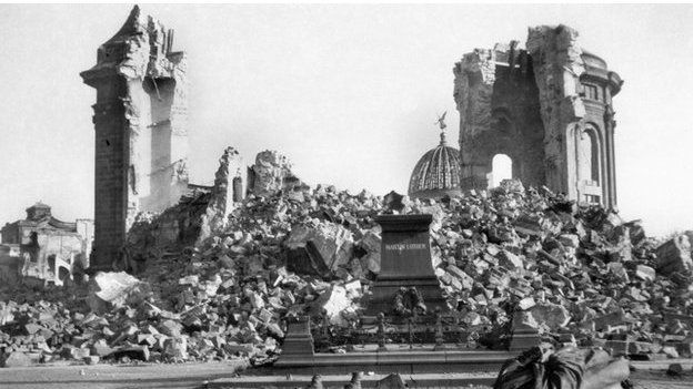 Dresden"s Frauenkirche (Church of Our Lady) and the destroyed Martin-Luther-Memorial in February 1945