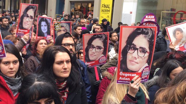 Women hold pictures of murder victim Ozgecan Aslan during protests in Istanbul on Saturday