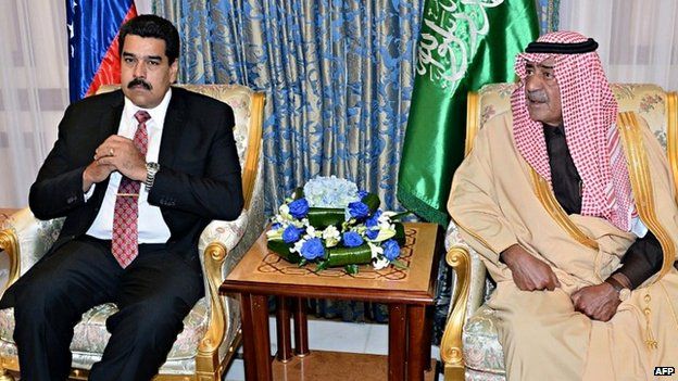 Saudi Deputy Prime Minister Prince Muqrin bin Abdulaziz al-Saud (R) with Venezuelan President Nicolas Maduro