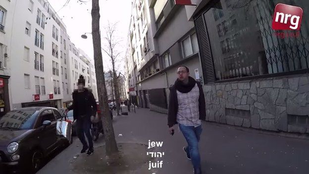 A resident shouts 'Jew' at Klein