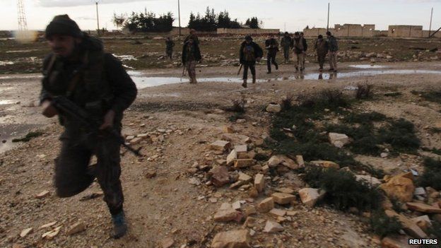Rebel fighters of al-Jabha al-Shamiya (the Shamiya Front) in heavy clashes with forces loyal to Syria's President Bashar al-Assad, north of Aleppo (17 February 2015)