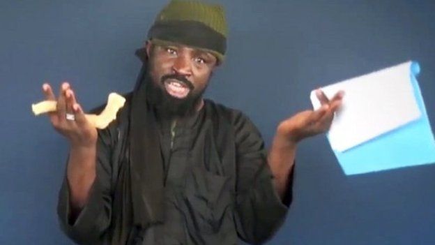 This screen grab image taken on February 18, 2015 from a video made available by Islamist group Boko Haram shows Boko Haram leader Abubakar Shekau making a statement at an undisclosed location