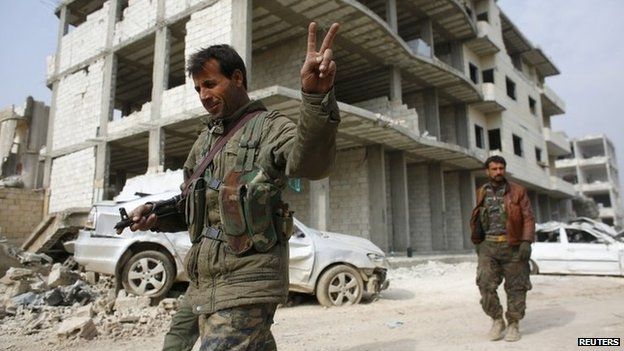 Kurdish YPG fighters in Kobane after driving IS militants from the town (28 January 2015)