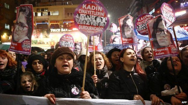 Women shout slogans and hold a portrait of 20-year-old Ozgecan Aslan during a demonstration in Ankara on 16 February 2015