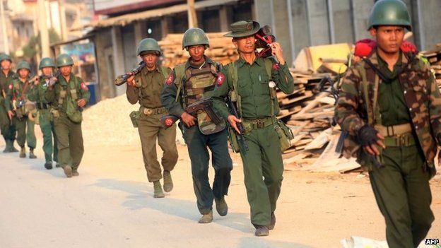 Myanmar soldiers patrol in Laukkai, the main city in the Kokang region of northern Myanmar Shan state, on February 16, 201