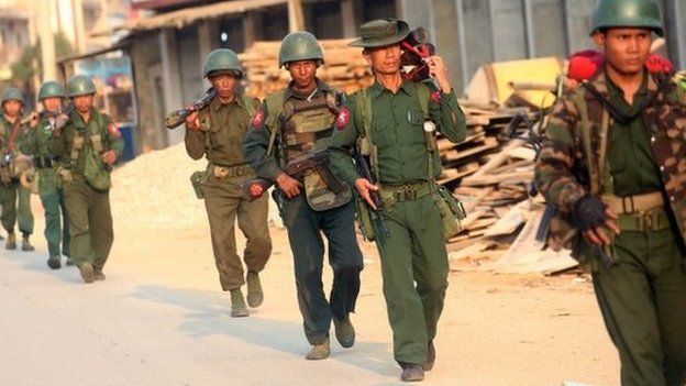 Myanmar soldiers patrol in Laukkai, the main city in the Kokang region of northern Myanmar Shan state, on February 16, 201