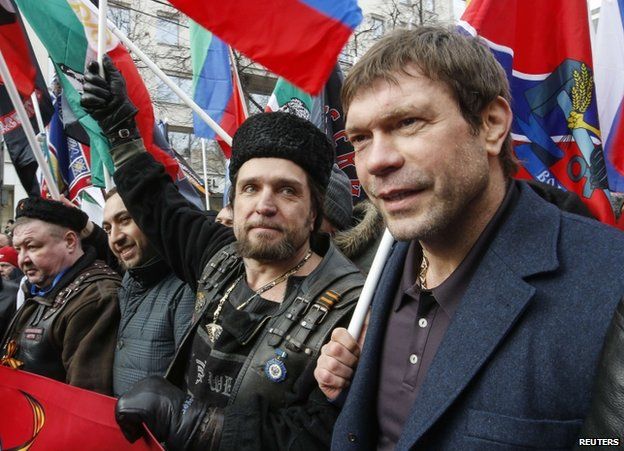 Oleg Tsarev (right) marches alongside Night Wolves leader Alexander Zaldostanov in Moscow, 21 February
