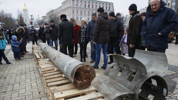 People in Kiev inspect weapons and equipment apparently seized from rebels in eastern Ukraine - 21 February