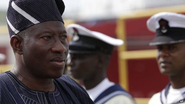 Nigeria's president Goodluck Jonathan, inspects the honour guard, during an event to commission Naval warships in Lagos, Nigeria on 19 February 2015