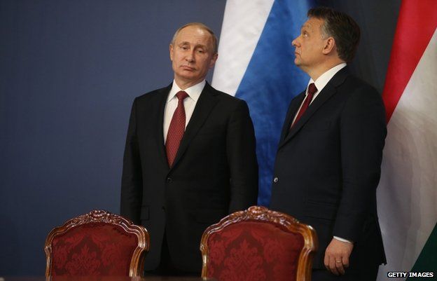 President Putin (L) with Mr Orban during his trip to Budapest (17 Feb)