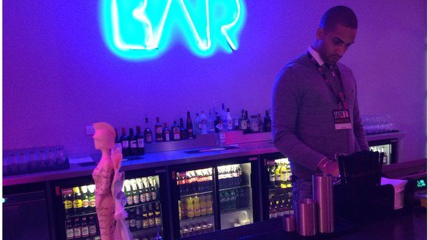 The Brit Awards 2015 trophy stands on the counter of the backstage bar