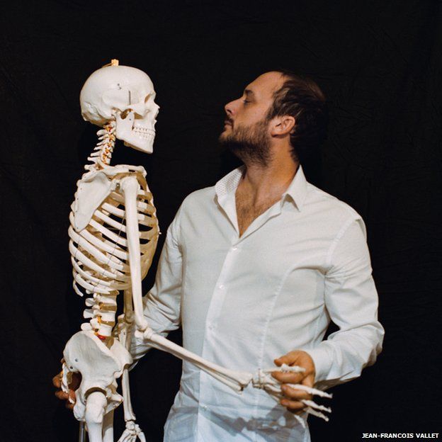 Man with skeleton