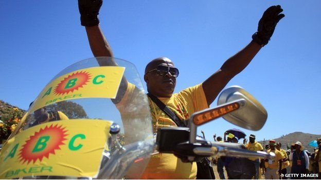 A biker supporter of Lesotho's All Basotho Convention (ABC) cheers on February 22, 2015 in Maseru, Lesotho