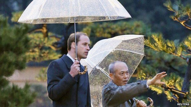 Prince William is escorted by Tokyo Governor Yoichi Masuzoe as he views the Hama Rikyu gardens in Tokyo