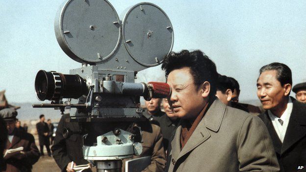 Kim Jong-il with a film camera