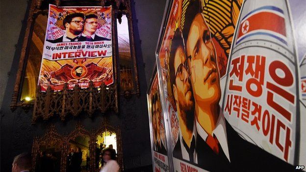 Movie posters for the premiere of the film 'The Interview' at The Theatre at Ace Hotel in Los Angeles, California on December 11, 2014.