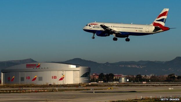 A plane operated by British Airways lands at Aena operated Barcelona