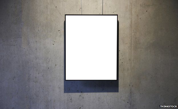 Blank canvas on gallery wall