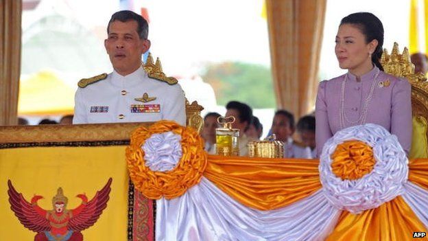Prince Maha Vajiralongkorn (L) and his consort Princess Srirasmi (R) look on during the Royal Ploughing ceremony in Bangkok, 10 May 2007.