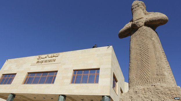 A statue dating back to the 8th Century BC is displayed at the entrance of Iraq's national museum during its official reopening on February 28, 2015