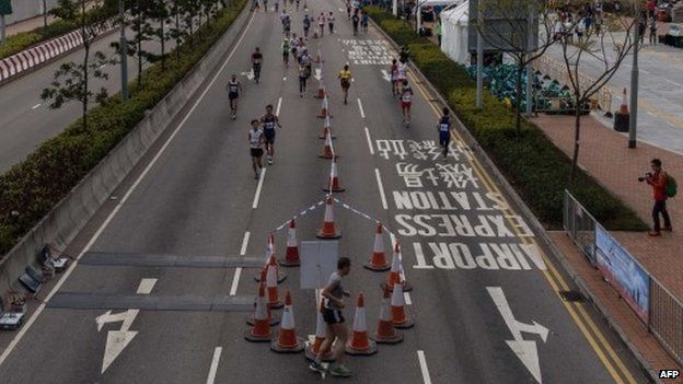 Competitors run in Hong Kong"s first inner city ultra marathon on March 1, 2015