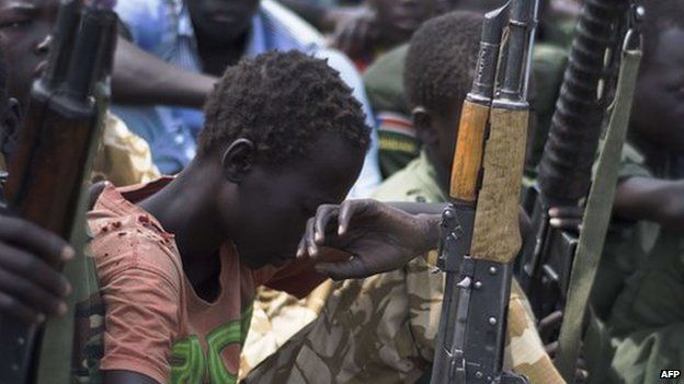 Former child soldiers at disarmament ceremony, South Sudan