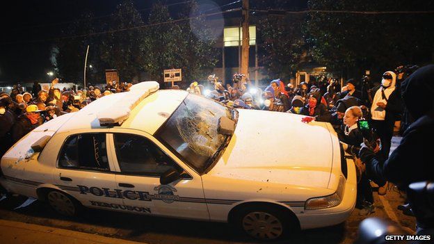 The shooting and subsequent grand jury decision sparked violent protests