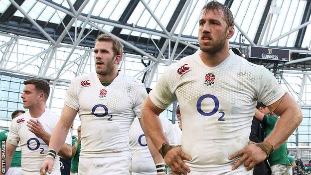 (From right to left) England captain Chris Robshaw, Tom Croft and George Ford walk off looking dejected after England's defeat in Dublin