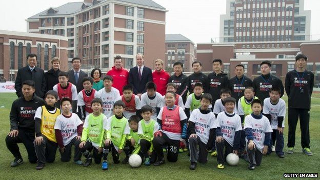 Prince William attends a football session in Shanghai, China