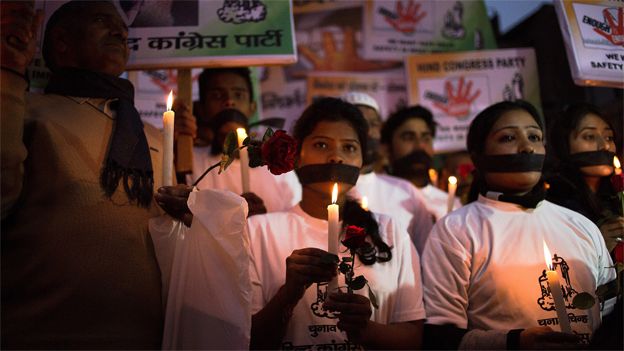 Indian activists mark the second anniversary of the fatal gang-rape of a student in Delhi on December 16, 2014.