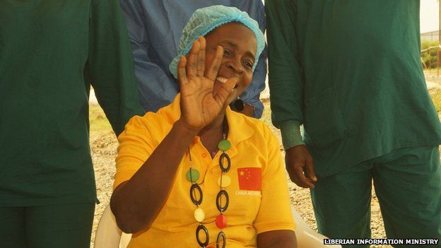 Beatrice Yardolo smiles and waves after recovering from Ebola