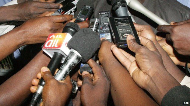 Journalists interviewing someone in Nigeria - 2012