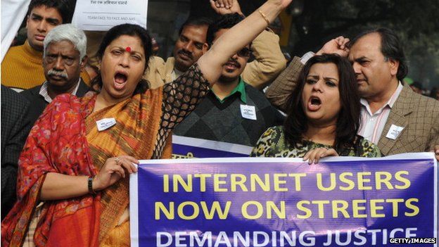 Indian activists hold banners and shout slogans during a protest in January 2013 against the gang rape and murder of a student in New Delhi
