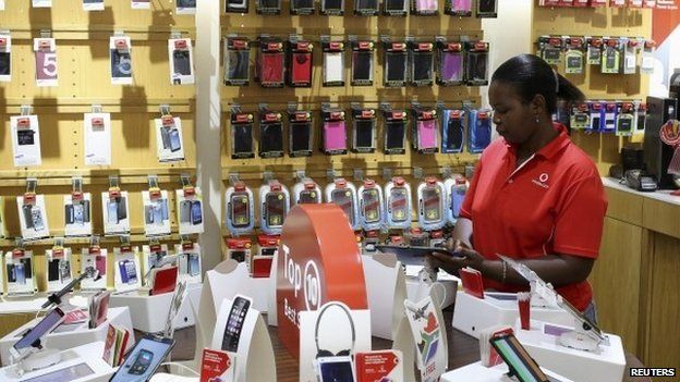 Female worker in Johannesburg South Africa in Vodacom shop