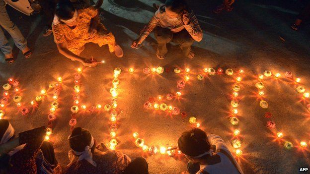 People write out MH370 in candles