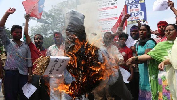 Activists of the Communists Party of India (CPI) burn an effigy representing the rapists convicted in the 2012 gang rape, in Hyderabad, March 6