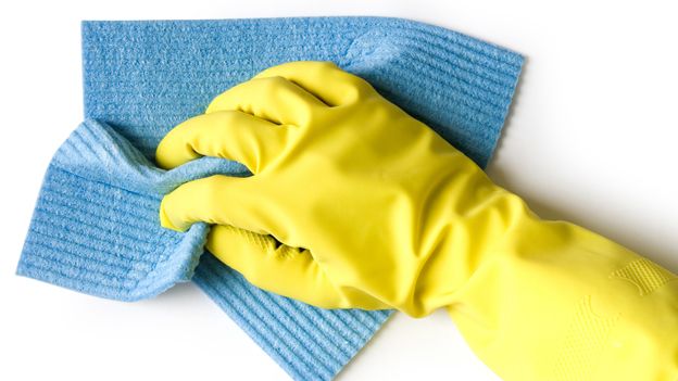 Yellow rubber glove and cloth