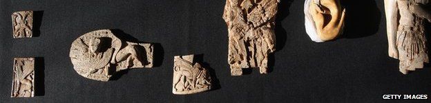 Some of a collection of 6,000 pieces of carved ivory known as the Nimrud Ivories discovered in the city of Nimrud in modern day Iraq but acquired by the British Museum are displayed in 2011 in London, the UK