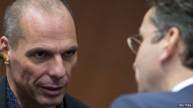 Varoufakis and Dijsselbloem looking face to face