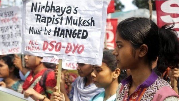 Socialist Unity Centre of India activists hold placards during a protest demanding death penalty for convicted gang-rapist, in Calcutta, 4 March