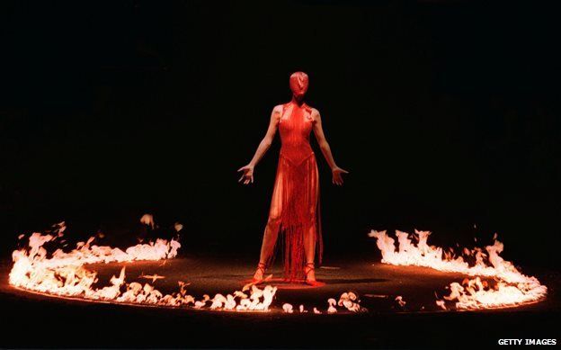 Erin O'Connor surrounded by a ring of fire at McQueen's autumn 1998 show